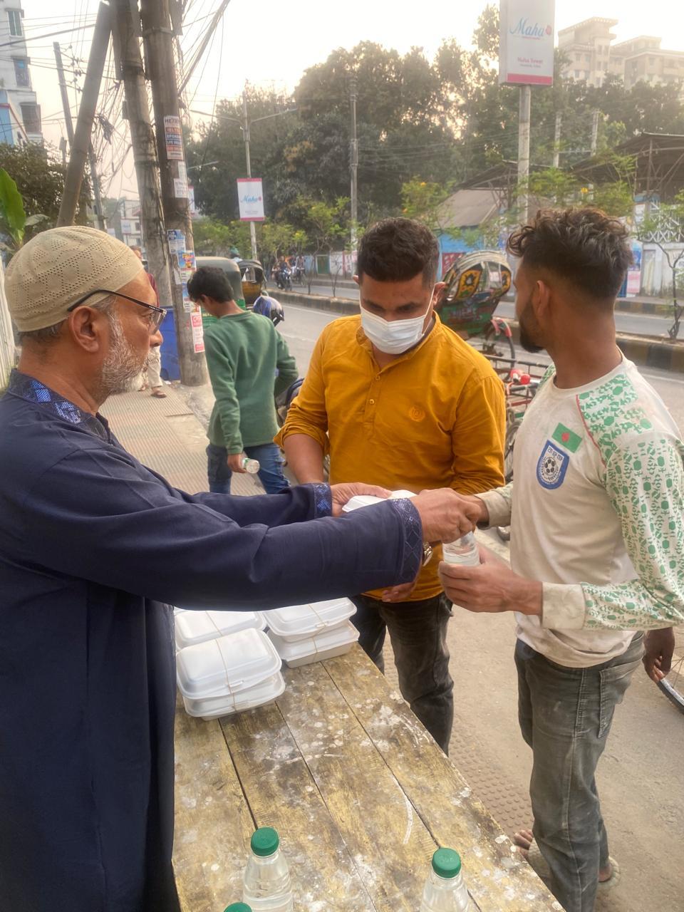 Hot meals handed out in the street